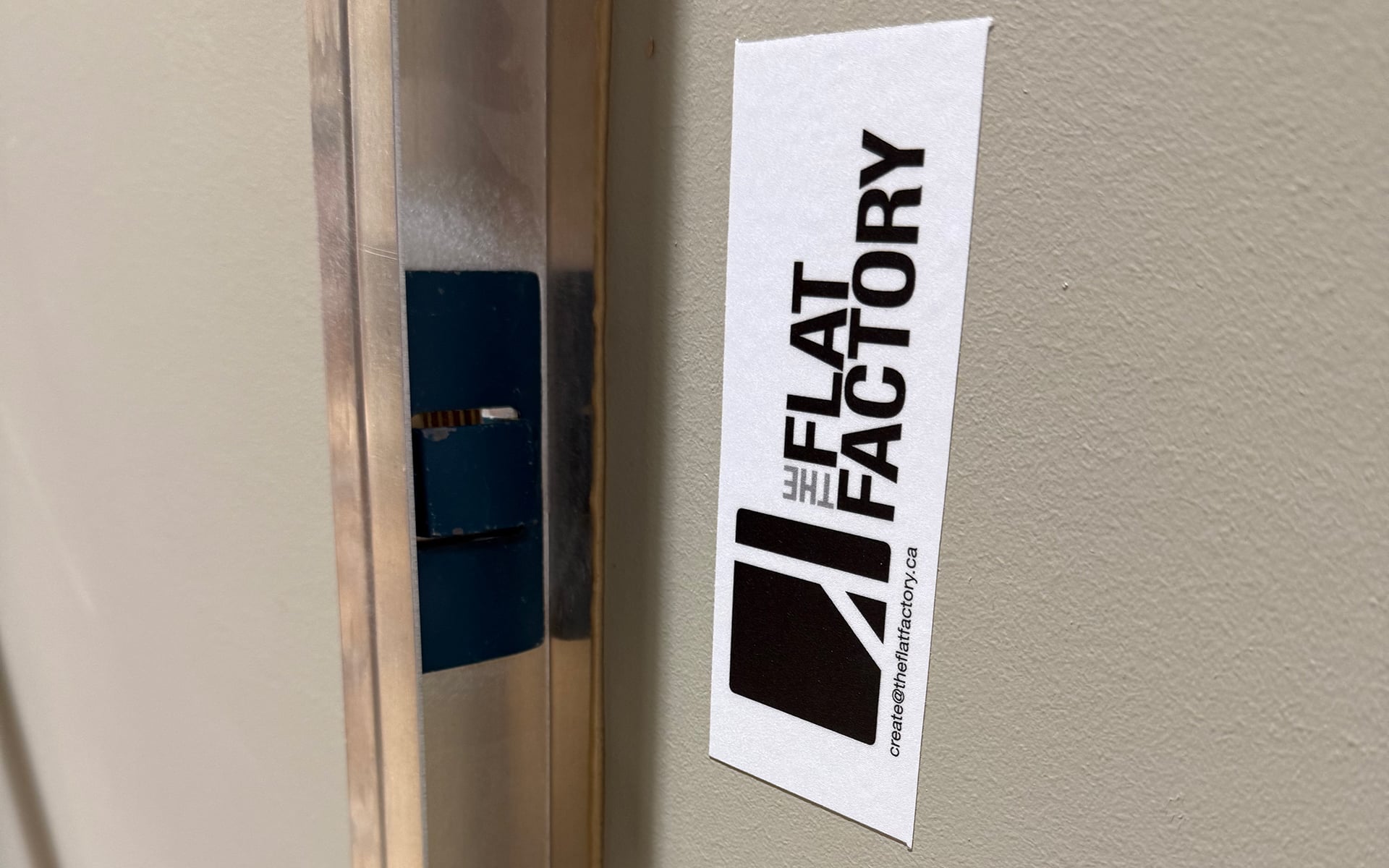 Modular indoor-outdoor wall panel with metal frame and wooden braces on soundstage